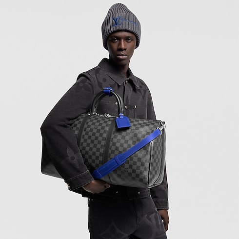 Bolsa de viaje Keepall 50 con bandolera Lona Damier Graphite Bolsos y pequeña marroquinería Bolso de hombre Novedades | LOUIS VUITTON (Zoom de producto)