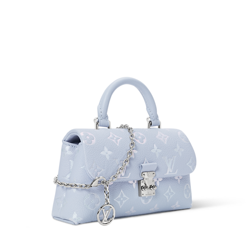 Bolso Nano Madeleine Piel Monogram Empreinte Mujer Carteras y pequeña marroquinería Bolsos Nano y carteras con cadena | LOUIS VUITTON (Zoom de producto)