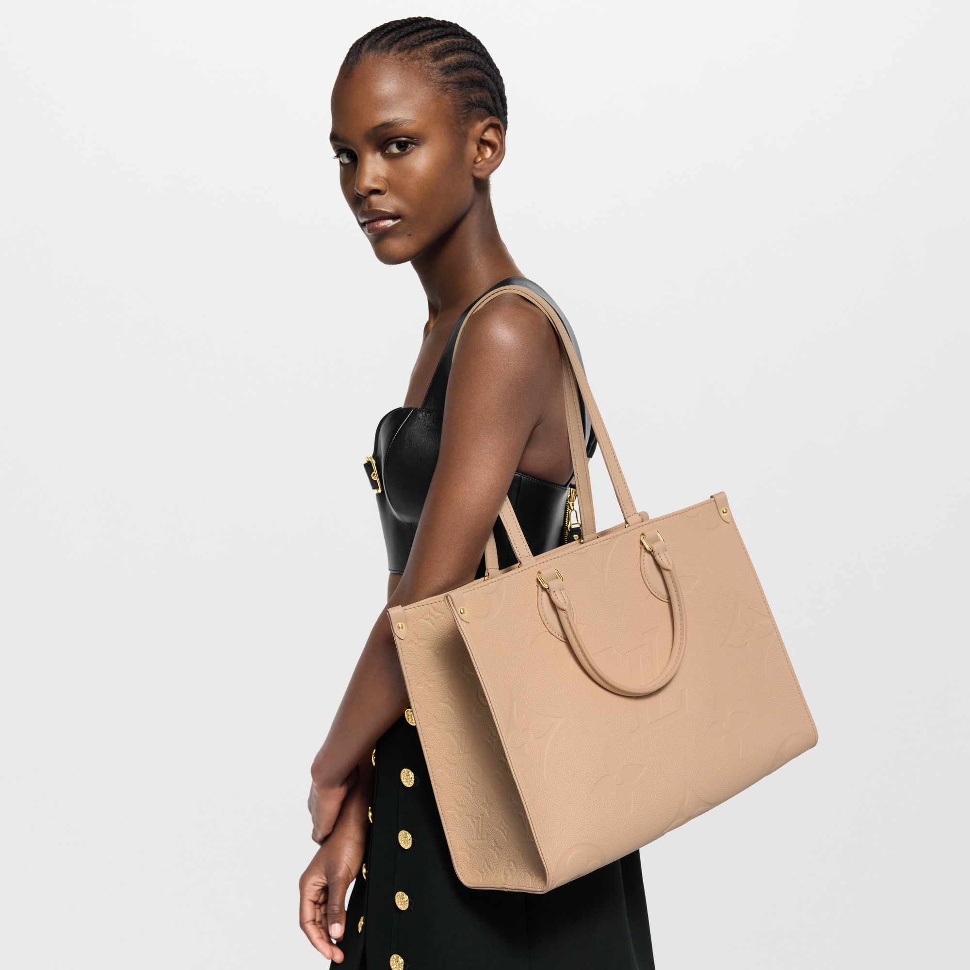 Bolso OnTheGo MM Piel Monogram Empreinte Mujer Bolsos Todas las colecciones | LOUIS VUITTON (Zoom de producto)