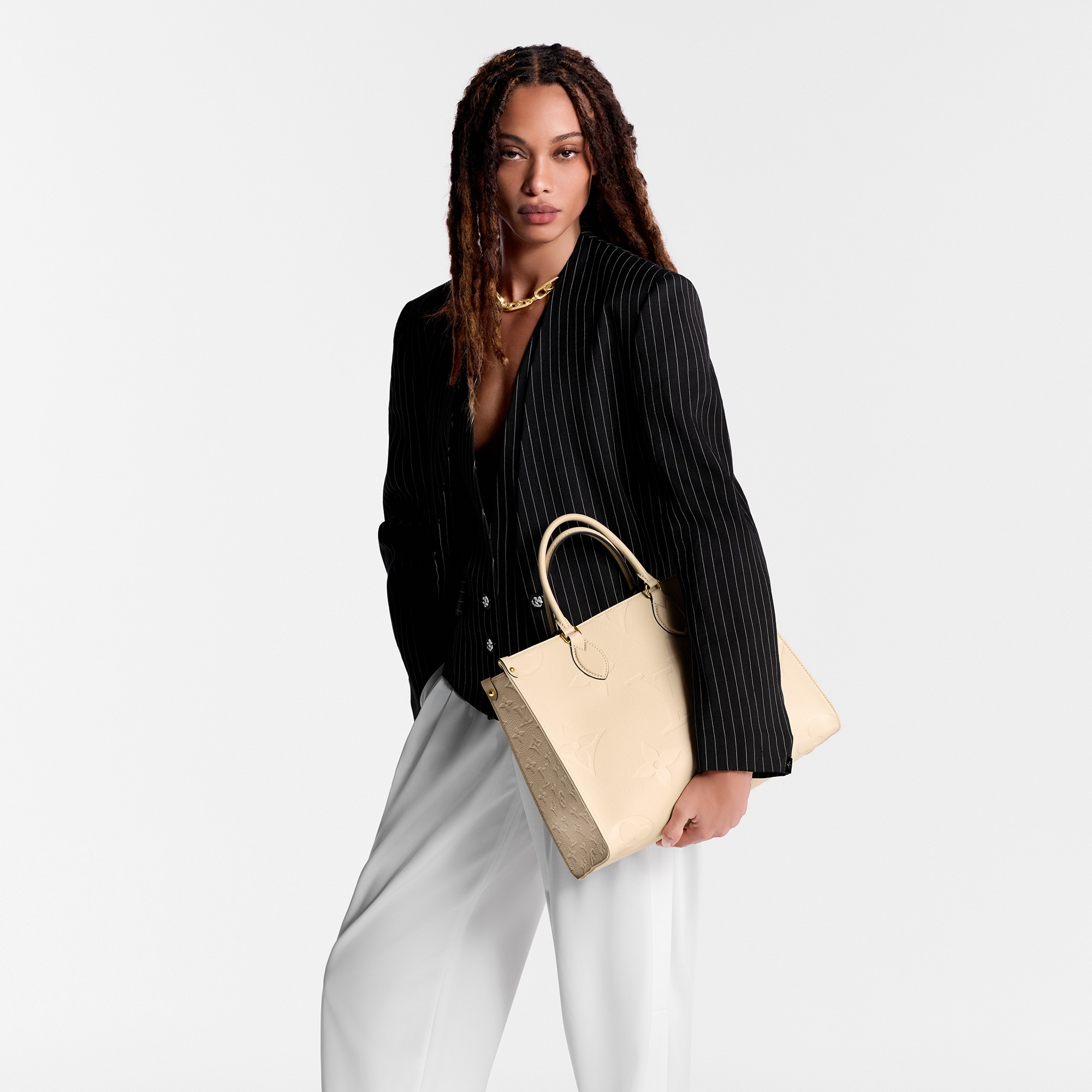Bolso OnTheGo MM Piel Monogram Empreinte Mujer Bolsos Todas las colecciones | LOUIS VUITTON (Zoom de producto)