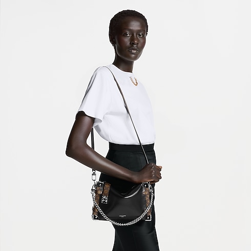 Bolso Side Trunk Vibe MM LV Vibe Bolsos y pequeña marroquinería Bolsos de mujer Icónicos Louis Vuitton | LOUIS VUITTON (Zoom de producto)