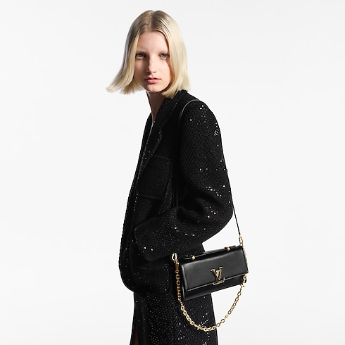 Cartera Capucines con cadena Capucines Mujer Carteras y pequeña marroquinería Carteras con cadena y mini bolsos | LOUIS VUITTON (Zoom de producto)