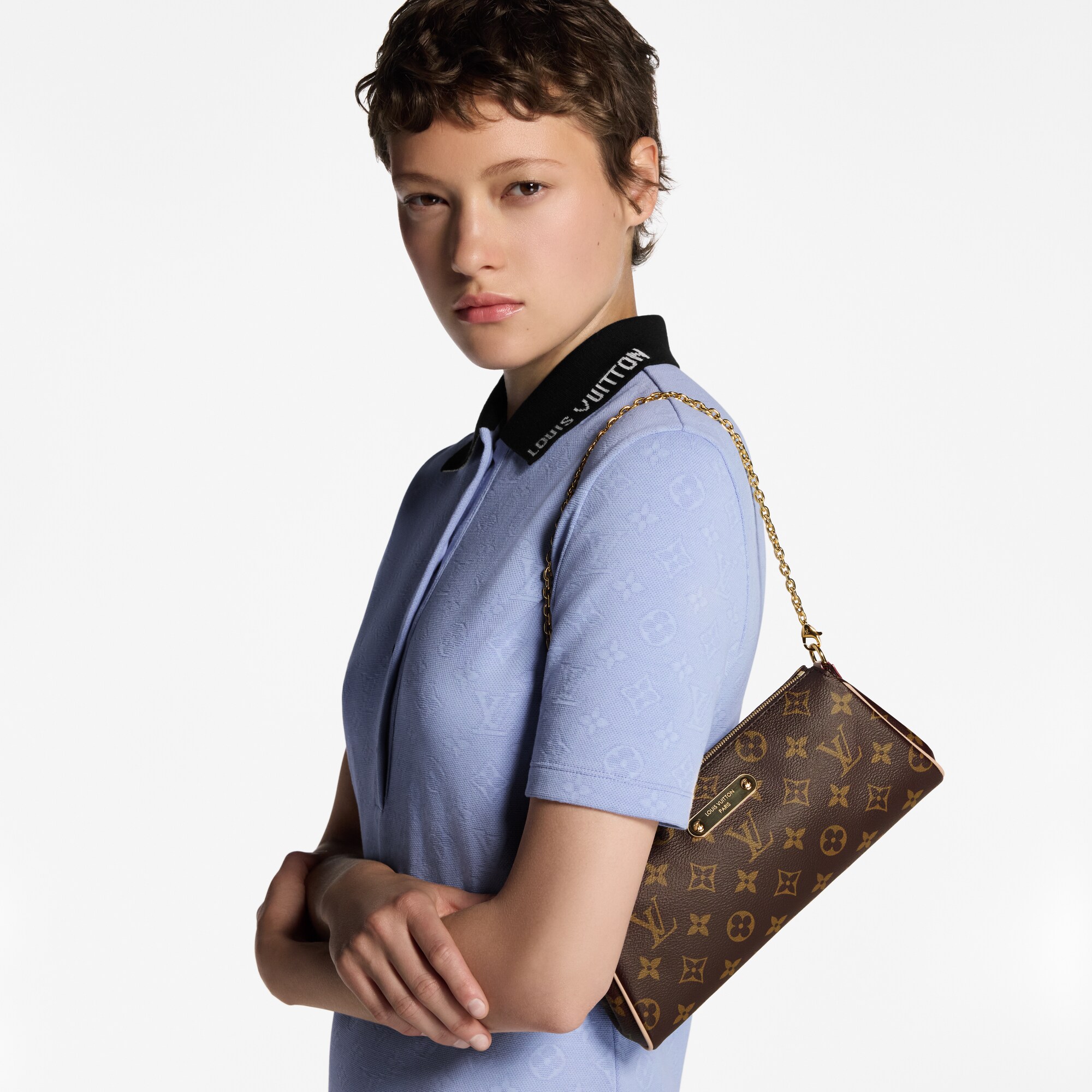 Cartera de mano Eva Lona Monogram Mujer Carteras y pequeña marroquinería Carteras con cadena y mini bolsos | LOUIS VUITTON (Zoom de producto)