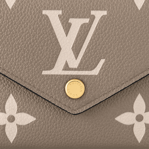 Cartera Victorine Piel Monogram Empreinte Bicolor Mujer Carteras y pequeña marroquinería Todas las carteras y pequeña marroquinería | LOUIS VUITTON (Zoom de producto)