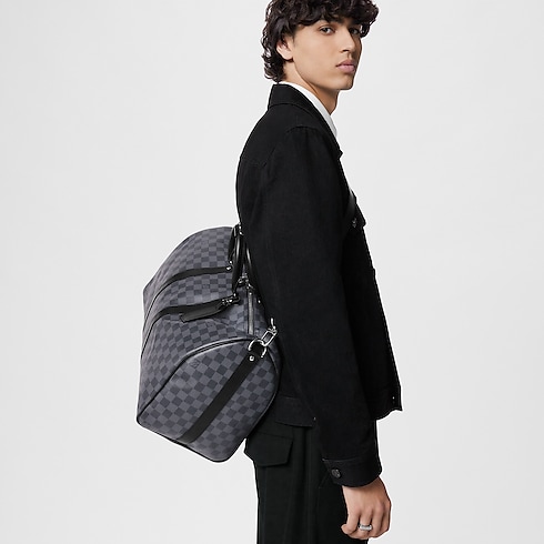 Keepall 45 con bandolera Toile Damier Graphite Hombre Viaje Todo el equipaje y accesorios | LOUIS VUITTON (Zoom de producto)