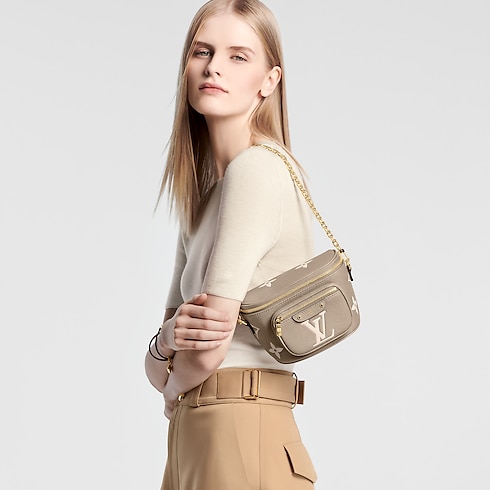 Mini Bumbag Piel Monogram Empreinte Bicolor Mujer Carteras y pequeña marroquinería Carteras con cadena y mini bolsos | LOUIS VUITTON (Zoom de producto)