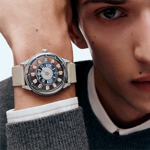 Reloj automático Tambour Spin Time de 42,5 mm en oro blanco, ojo de halcón y diamantes Relojería Todos los relojes } | LOUIS VUITTON (Zoom de producto)