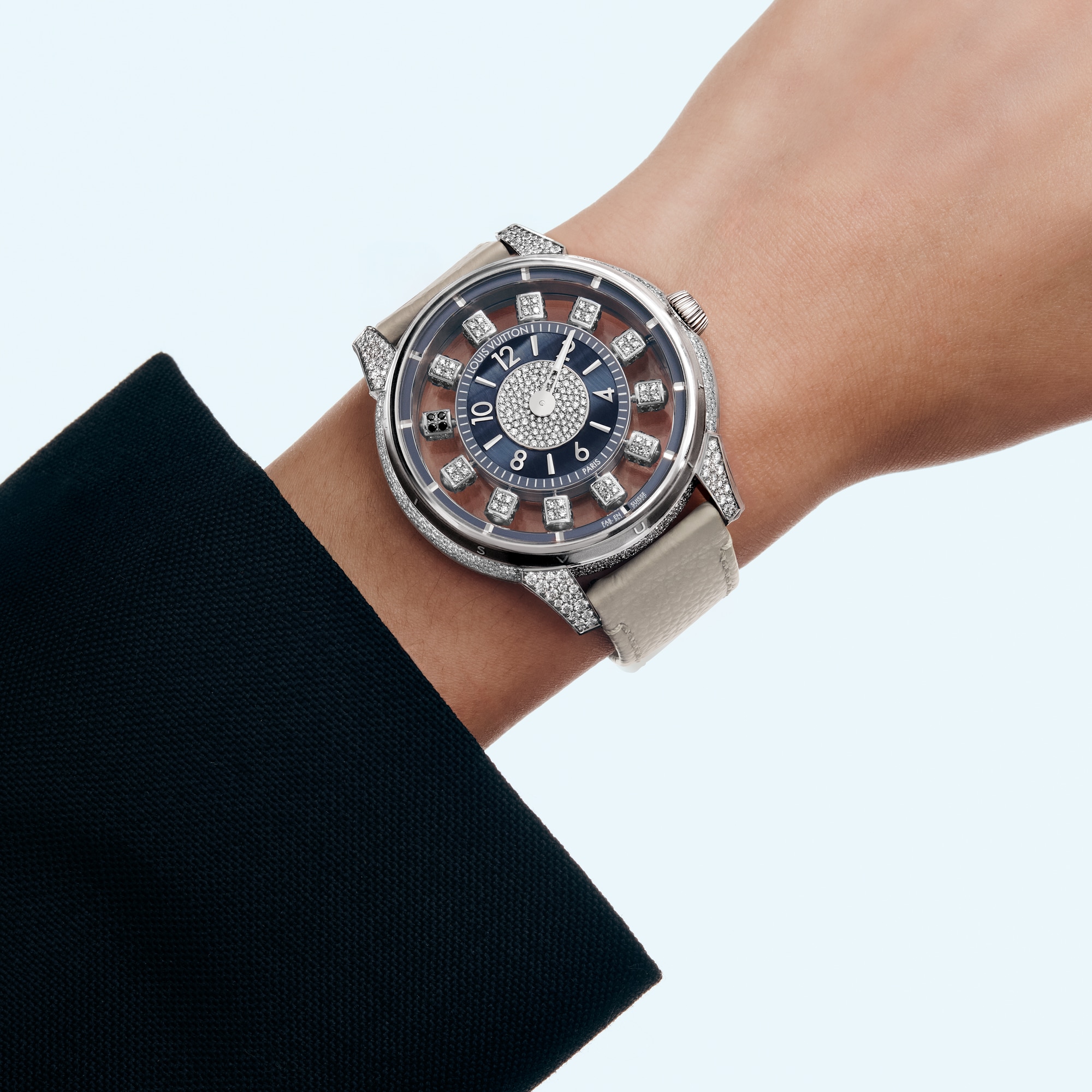 Reloj automático Tambour Taiko Spin Time Air de 42,5 mm en oro blanco, ojo de halcón y diamantes  Relojería Todos los relojes } | LOUIS VUITTON (Zoom de producto)